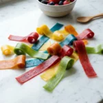 do fruit roll ups have gelatin candy rolls on white marble