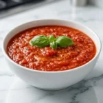 ina garten tomato sauce recipe served over spaghetti with fresh basil