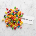 do jelly beans have gelatin colorful assortment on white marble