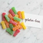 does sour patch kids have gelatin colorful candies on white marble