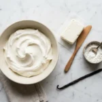 stabilized whipped cream without gelatin cream cheese method on white marble