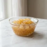 what is bovine gelatin — bloomed beef gelatin in glass bowl on marble surface