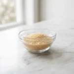 hat is horse gelatin powder in a glass bowl on marble